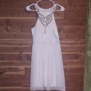 Chic White Backless Dress with Embellishments